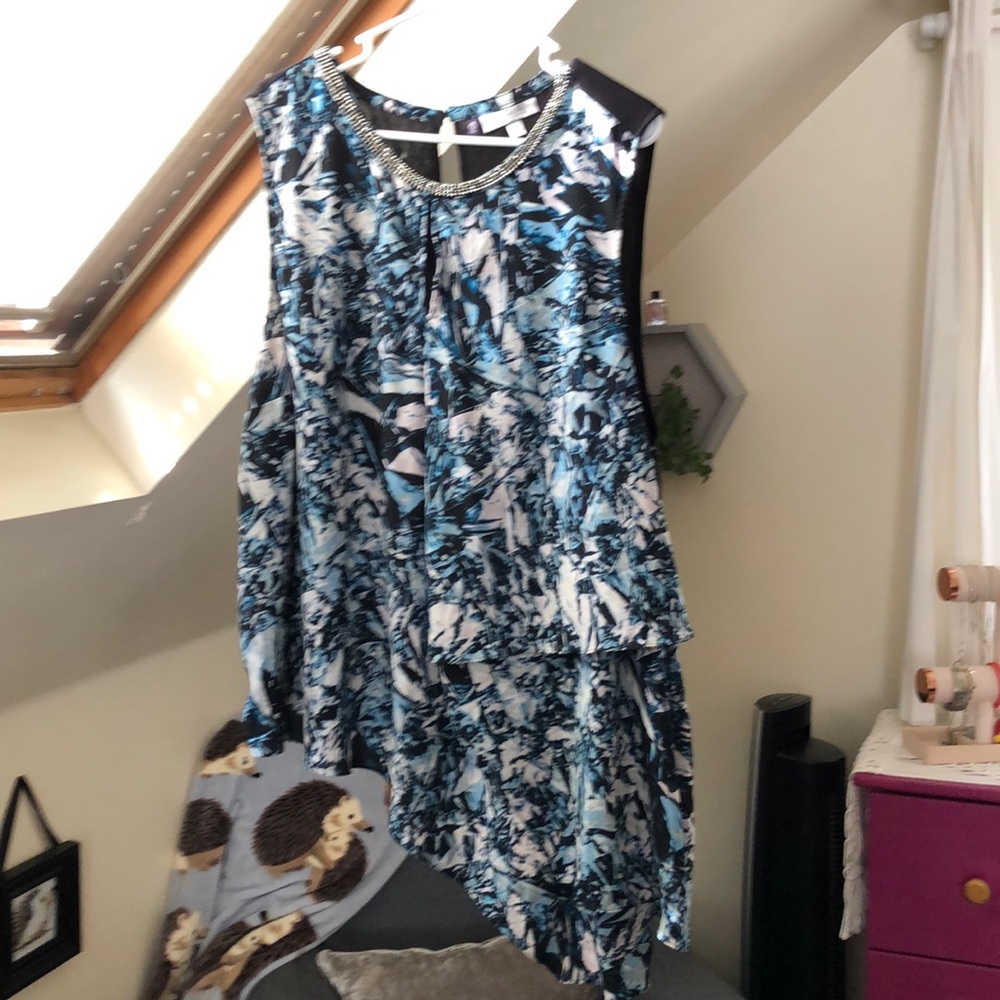 Asymmetrical Jennifer Lopez top